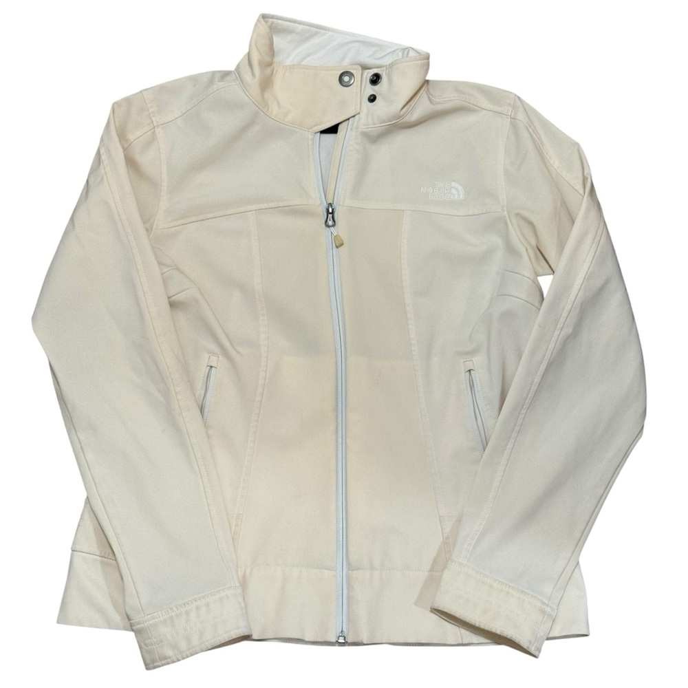 The North Face cream softshell jackets women’s size L wind proof stretch